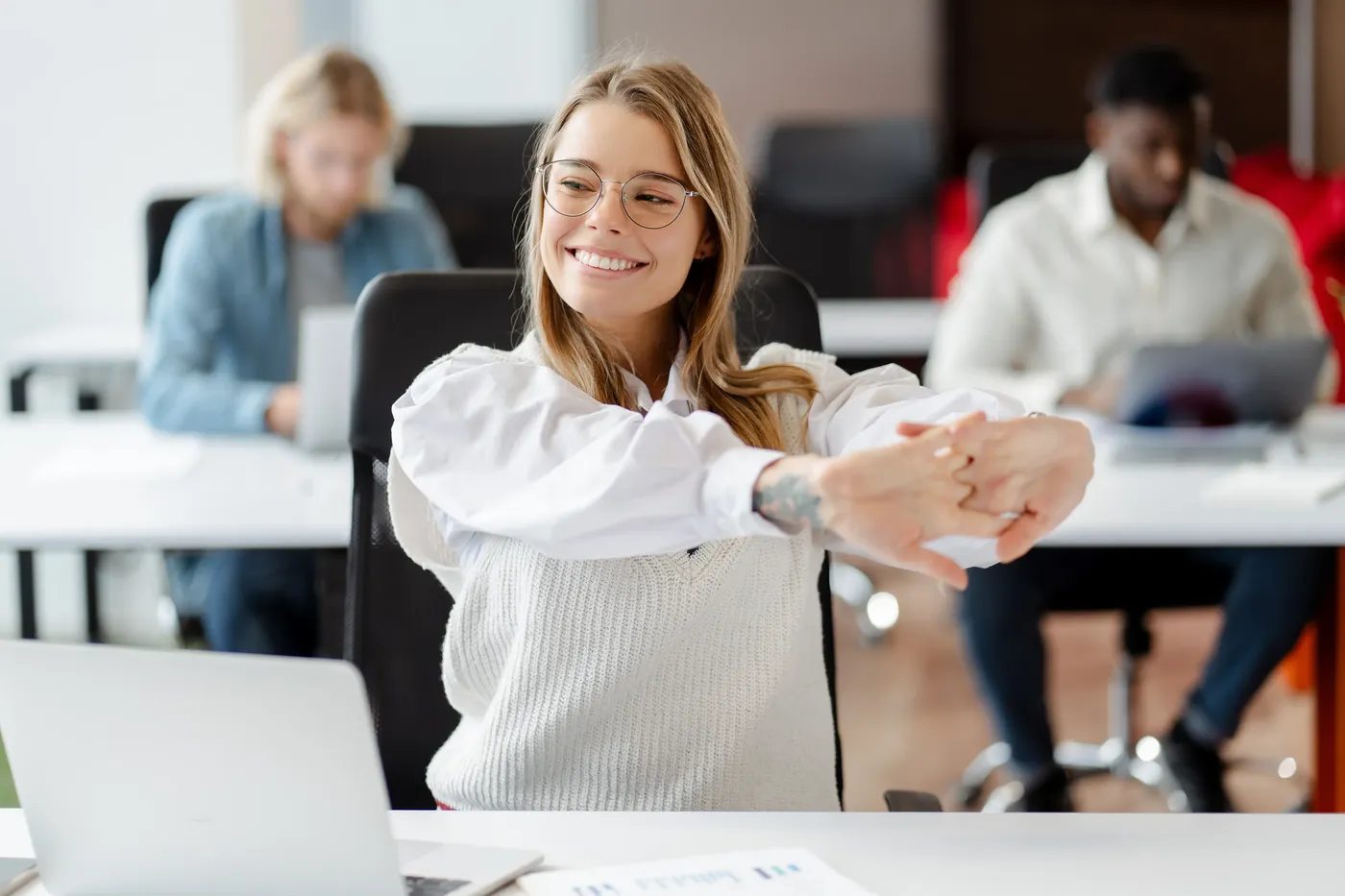 Stretching at desk 